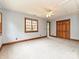 Spacious bedroom with ceiling fan and large closet at 3231 Karen Ln, Monroe, NC 28110
