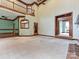 Expansive living room showcasing a staircase, hardwood floors, and an open-concept design at 3231 Karen Ln, Monroe, NC 28110