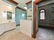 Elegant bathroom showcasing a glass shower, dual sinks, and walk-in closet at 3231 Karen Ln, Monroe, NC 28110