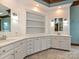 Elegant bathroom featuring dual sinks, white cabinets, and tasteful fixtures at 3231 Karen Ln, Monroe, NC 28110
