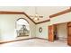 Bedroom featuring high ceilings, decorative trim, and a large window at 3231 Karen Ln, Monroe, NC 28110
