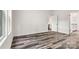 Bedroom features wood-look floors and access to the kitchen at 3567 Farmfield Dr, Claremont, NC 28610