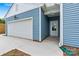 Exterior view of the home showcasing the garage, front door, and address at 3567 Farmfield Dr, Claremont, NC 28610