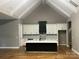 Bright kitchen featuring a spacious island, modern cabinetry, and open layout, seamlessly connected to the living space at 3733 Whitney Ne Dr, Hickory, NC 28601