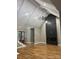Spacious living room with vaulted ceilings, hardwood floors, and a modern fireplace, creating an inviting atmosphere at 3733 Whitney Ne Dr, Hickory, NC 28601