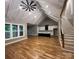 Open-concept living space with hardwood floors, modern kitchen, and staircase, perfect for entertaining and Gathering living at 3733 Whitney Ne Dr, Hickory, NC 28601