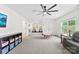 This bonus room has carpet floors, shelving, and room to play at 3748 Tea Olive Rd, Gastonia, NC 28056