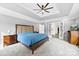 This main bedroom offers a trey ceiling with ceiling fan and ensuite bath with closet at 3748 Tea Olive Rd, Gastonia, NC 28056