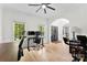 Bright and airy office space with hardwood floors, a ceiling fan, and natural light at 3748 Tea Olive Rd, Gastonia, NC 28056