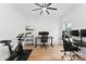 Bright office space with multiple workstations, a ceiling fan and natural light at 3748 Tea Olive Rd, Gastonia, NC 28056