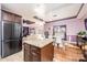 Open concept kitchen-dining room combo with stainless steel appliances at 3837 1St Street Nw Ln, Hickory, NC 28601