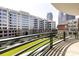 Relaxing balcony view of the courtyard, nearby buildings and skyscrapers at 400 N Church St # 413, Charlotte, NC 28202
