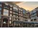 Exterior view of multi-story building with balconies at 400 N Church St # 413, Charlotte, NC 28202