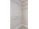Walk-in closet with wire shelving for storage at 400 N Church St # 413, Charlotte, NC 28202