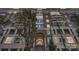 Beautiful brick apartment building with balconies and an arched entryway at 400 N Church St # 413, Charlotte, NC 28202