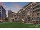 Exterior view of a building overlooking the terrace with a steel arbor at 400 N Church St # 413, Charlotte, NC 28202