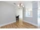 Sun-filled living room with wood floors and neutral paint at 400 N Church St # 413, Charlotte, NC 28202