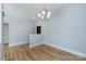 Bright living room features wood floors and simple decor at 400 N Church St # 413, Charlotte, NC 28202
