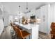 Bright, modern kitchen with a spacious island, stylish pendant lights, and stainless steel appliances at 4002 Tundra Rd, Charlotte, NC 28203
