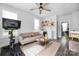 Inviting living space with a peloton, mini-bar, comfortable seating, and stylish decor at 4002 Tundra Rd, Charlotte, NC 28203