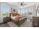 Serene main bedroom featuring a large bed, neutral tones, ample natural light, and modern furnishings at 4002 Tundra Rd, Charlotte, NC 28203