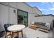 Outdoor patio with comfortable seating and a table, perfect for relaxing outdoors at 4002 Tundra Rd, Charlotte, NC 28203