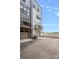 Townhouse with garage, balcony, and a neutral exterior, complete with a fenced-in backyard at 4002 Tundra Rd, Charlotte, NC 28203