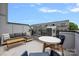 Inviting rooftop deck with comfortable seating, a table, and views of the surrounding neighborhood at 4002 Tundra Rd, Charlotte, NC 28203