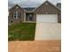 Charming brick home featuring a two-car garage and a well-manicured lawn at 4172 Saltwood Dr, Hickory, NC 28602