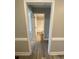 Hallway shot with views of rooms and wood-look flooring at 4172 Saltwood Dr, Hickory, NC 28602