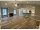 Open-concept living room with a fireplace at 4172 Saltwood Dr, Hickory, NC 28602