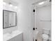 Bathroom featuring bright lighting, and tiled shower/tub at 4227 Coopersdale Rd, Charlotte, NC 28273