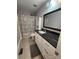Bathroom featuring a long vanity with black granite countertops and neutral grey walls at 440 Mt Moriah Church Rd, China Grove, NC 28023