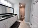Stylish bathroom with a granite countertop vanity, double sinks, and tiled flooring at 440 Mt Moriah Church Rd, China Grove, NC 28023