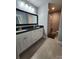Bathroom featuring a long vanity with double sinks and black granite countertops at 440 Mt Moriah Church Rd, China Grove, NC 28023