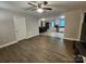 Bright living room boasts wood flooring, neutral paint, and an open floor plan at 440 Mt Moriah Church Rd, China Grove, NC 28023