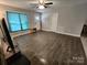Cozy living room with wood flooring and a view of the home's front entrance at 440 Mt Moriah Church Rd, China Grove, NC 28023