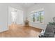 Open-concept living room with hardwood floors and plenty of natural light at 471 Lucky Nw Dr, Concord, NC 28027