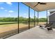 Screened-in porch with lounge chair offers scenic outdoor views at 471 Lucky Nw Dr, Concord, NC 28027