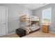 Bedroom featuring a bunk bed, providing a functional and comfortable space at 4853 Walnut Grove St, Harrisburg, NC 28075