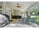 Open outdoor patio with dining set, ideal for enjoying meals and gatherings with a view of the landscaped backyard at 4853 Walnut Grove St, Harrisburg, NC 28075