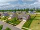 Attractive aerial view of a brick-faced house with a well-kept lawn, complementing the surrounding homes in a serene neighborhood setting at 4926 Trayton Ave, Gastonia, NC 28056