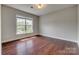 Bright bedroom with a large window offering a view of the neighborhood at 4926 Trayton Ave, Gastonia, NC 28056