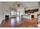 Spacious living area flowing into kitchen with modern appliances and fireplace feature at 4926 Trayton Ave, Gastonia, NC 28056