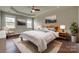 Relaxing main bedroom with tray ceilings, natural light, and stylish decor at 4926 Trayton Ave, Gastonia, NC 28056