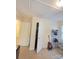 A carpeted bedroom with storage options including an attic access and closet at 522 Pennsylvania Ave, Charlotte, NC 28216