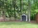 Backyard shed in wooded area at 5619 Fenway Dr, Charlotte, NC 28273