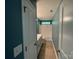 Well-lit bathroom featuring a tub and shower combo with a window at 5619 Fenway Dr, Charlotte, NC 28273