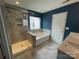 Bathroom featuring a separate tub and glass-enclosed shower at 5619 Fenway Dr, Charlotte, NC 28273