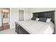 Relaxing bedroom with large bed and a view to a bathroom at 5712 Runnel Way, Charlotte, NC 28215